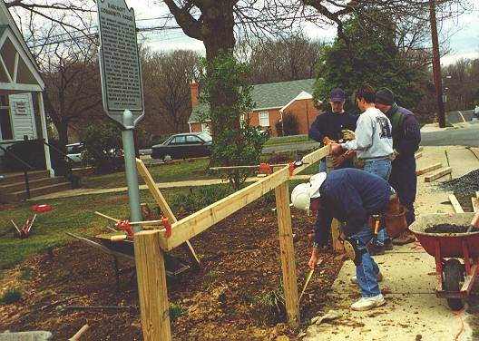 Volunteers led by master craftsman Bruce Atkinson building the BCH picket fence - 2000