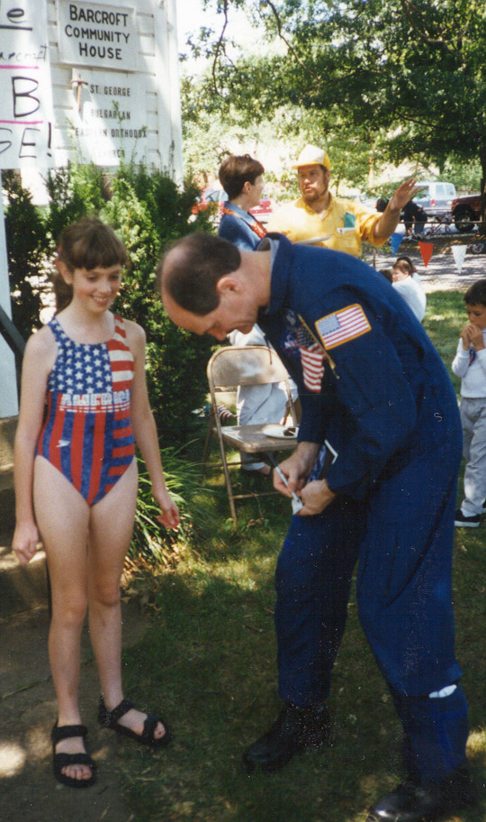 Astronaut Guy Gardner signs autograph for Lauren Wilson